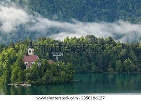 Lake Bled  Reflections in the Julian Alps, European Alps Bled, Radovljica Slovenia Royalty-Free Stock Photo #2350186127