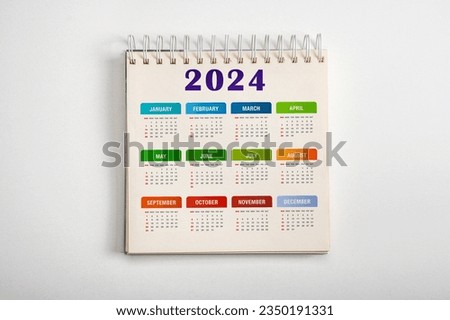 Calendar Year 2024 schedule. colorful 2024 desk calender notepad on white background. 12 months desk calendar. New Year plans for 2024