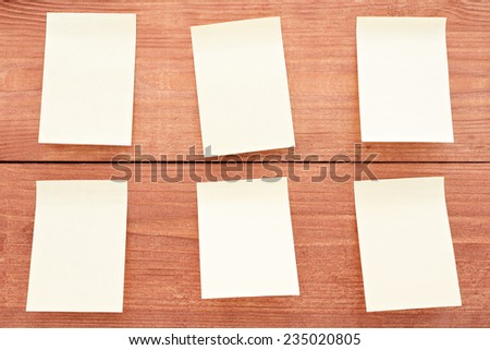 Six stickers on wood background