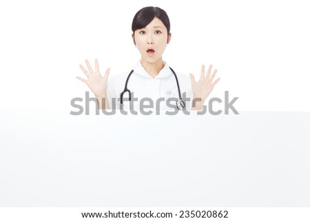 surprised Japanese nurse with Bulletin Board