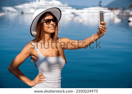 Phone, shopping or woman taking selfie for a social media profile picture on summer holiday.