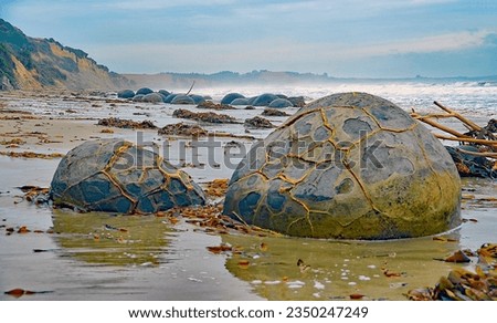 Moeraki boulders, Panorama of a beach in new Zealand Royalty-Free Stock Photo #2350247249
