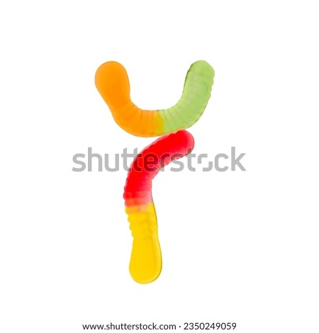 Letter Y made of multicolored gummi worms and isolated on pure white background. Food alphabet concept. One letter of the set of sweet food font easy to stacking