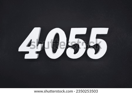 Black for the background. The number 4055 is made of white painted wood.