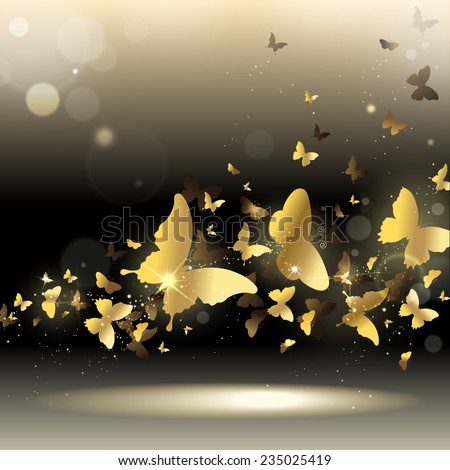 whirlwind of gold butterflies on a dark background