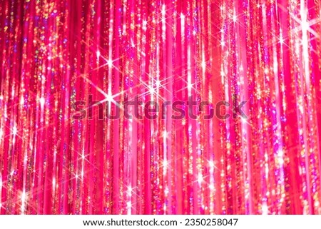 Glitter pink tassel curtain background.