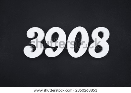 Black for the background. The number 3908 is made of white painted wood.