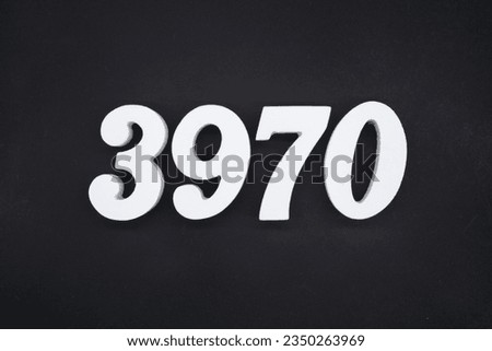 Black for the background. The number 3970 is made of white painted wood.