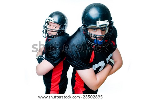 Two American football players, isolated on white background