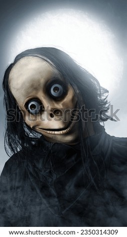 Scary Momo standing with a night scene background. Scary face for Halloween. Halloween concept