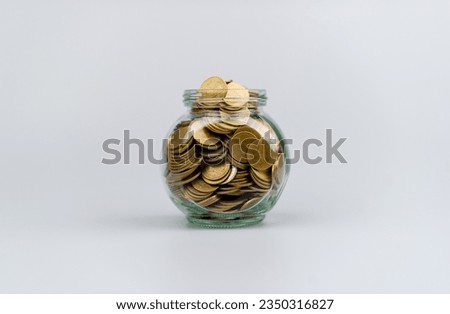 Saving money, coin in glass jar, investment, income, salary, cash flow, currency. Financial savings set. Financial Assets Inheritance Financial Growth and Investment