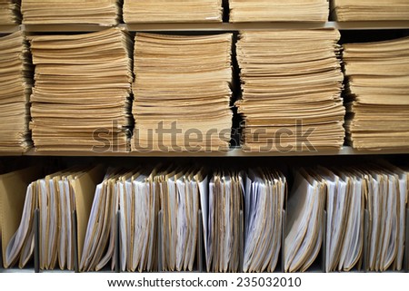 Shelf with file folders in a archives Royalty-Free Stock Photo #235032010