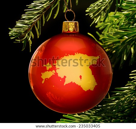A red bauble with the golden shape of  Estonia hanging on a christmas tree isolated on black.(series)