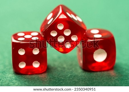 Dice, beautiful dice placed on green felt surface, selective focus. Royalty-Free Stock Photo #2350340951