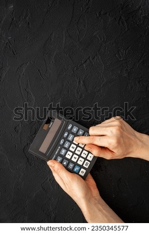 Financial business report preparing with calculator on office table