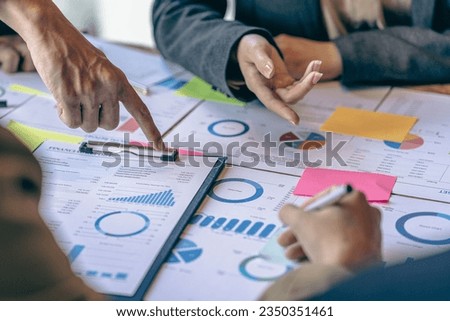 Business analytics team examining financial statements to verify internal control system, accounting firm, accountant working on laptop while checking home invoice or financial documents. Royalty-Free Stock Photo #2350351461
