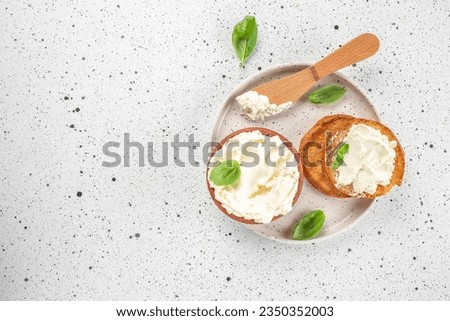 Cream cheese sandwich on a light background. banner, menu, recipe place for text, top view, Royalty-Free Stock Photo #2350352003