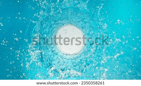 Freeze Motion of Rotating Water in Twister Shape. Filmed on High Speed Cinema Camera, 1000 fps. Royalty-Free Stock Photo #2350358261