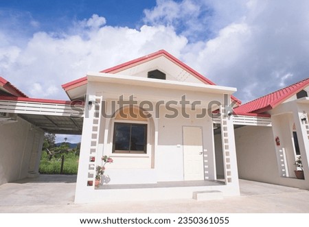 small house, red roof tiles, blue cloud sky background, a little house.