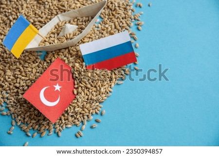 Ukrainian grain wheat, Turkey flag. Grain deal and problem of blockade of ports, grain corridor, Ukraine Russia conflict. Royalty-Free Stock Photo #2350394857