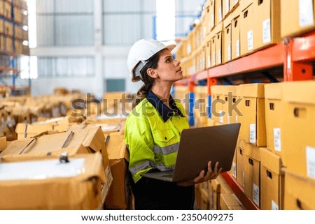 Portrait engineer woman shipping order detail check goods and supplies on shelves with goods background inventory in factory warehouse.logistic industry and business export	