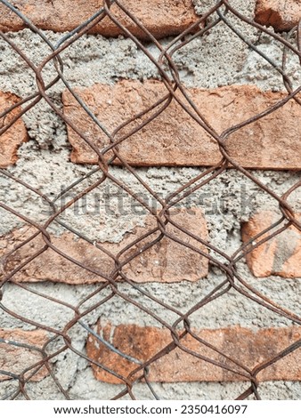 photo brick texture with triangle wire can use for wallpaper,digital poster etc