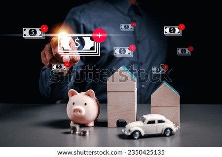 asset, piggy bank, financial, banking, finance, investment, currency, profit, money, wealth. pointing at banking note. real estate and asset is currency of wealth. asset is financial profit finance.
