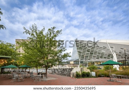 Early morning at the fountain in the triangle park in Lexington, KY in front of newly built conference and sport arena establishment in the city Royalty-Free Stock Photo #2350435695