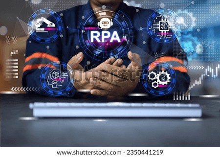 Robotic process automation concept, automation technology engineer holding RPA to support factory service provider industry 4.0 with precision machine for more efficiency productivity high quality. Royalty-Free Stock Photo #2350441219