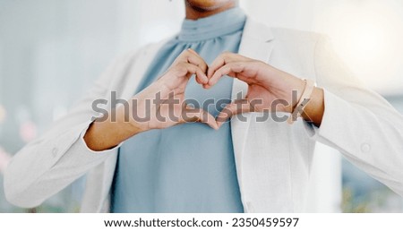 Hands, heart and business woman with love emoji for care, kindness and symbol in office. Closeup of happy female worker with finger shape for thank you, trust and sign of hope, support icon and peace Royalty-Free Stock Photo #2350459597