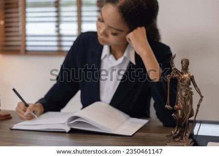 Justice and law concept. Law, legal judgement, courtroom gavel, African American attorney, lawyers discussing contract or business agreement at law firm office, Lawyer woman.