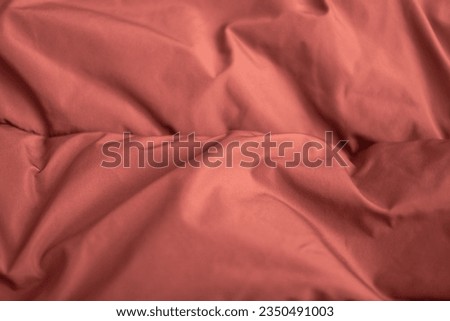 Texture fabric. Textile brown knitted cloth background.