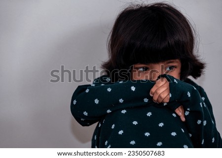 Sad Little Girl Pondering Her Future Royalty-Free Stock Photo #2350507683