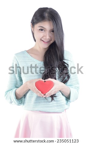 Woman holding heart