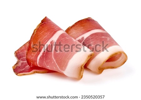 Dry Spanish ham, Jamon Serrano, Bellota, Italian Prosciutto Crudo or Parma ham, isolated on white background Royalty-Free Stock Photo #2350520357