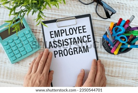 word EAP Employee Assistance Program text on white paper on light background Royalty-Free Stock Photo #2350544701