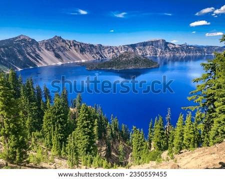 Summer View of Wizard Island at Crater Lake National Park in Oregon. Royalty-Free Stock Photo #2350559455
