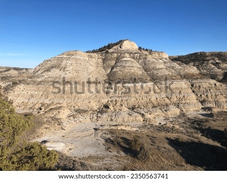 Hiking the Highest Point in North Dakota - White Butte Royalty-Free Stock Photo #2350563741