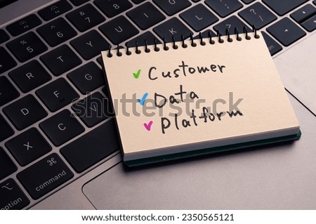 There is wood cube with the word Customer Data Platform. It is as an eye-catching image. Royalty-Free Stock Photo #2350565121