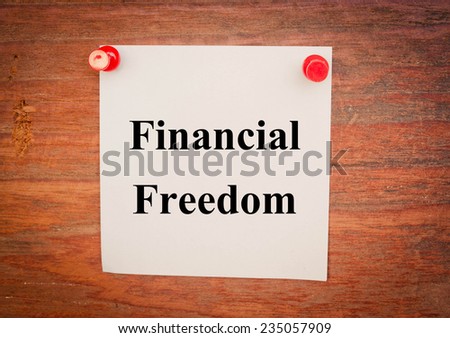 Text financial freedom on note paper