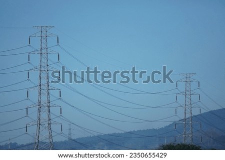 high-voltage electric poles, in the city