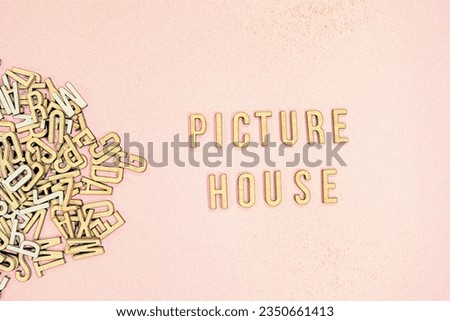 PICTURE HOUSE word in wooden English language capital letters spilling from a pile of letters on an orange background pencil sketch