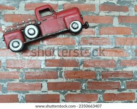 Find a picture of a red brick wall. on shutter stock website in the form of illustrations

￼

￼

￼

￼การแปลสด

