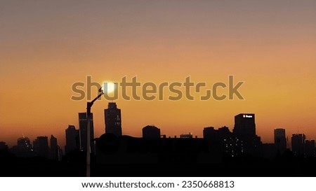 Silhouette photo of a building at sunset 
