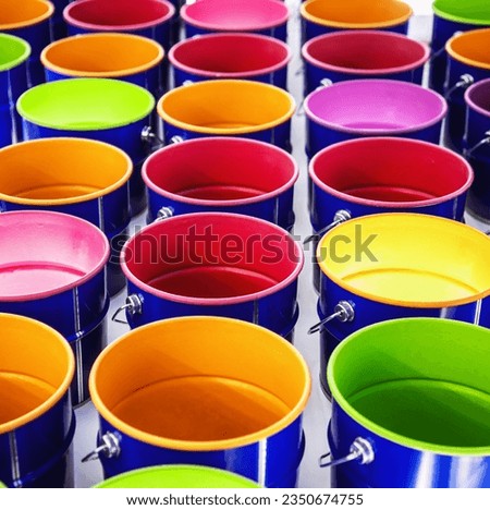 metal cans with multicolored paint. Background of paint cans