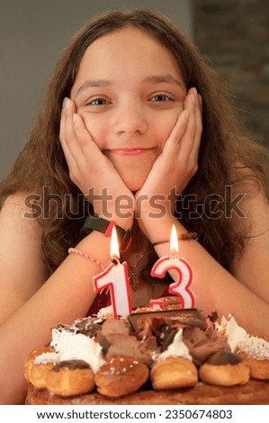 Teenager girl portrait anniversary including birthday cake and candles Royalty-Free Stock Photo #2350674803