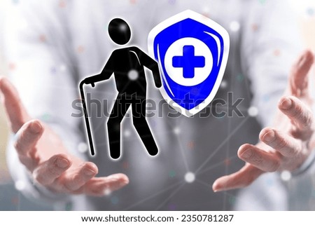 Old age insurance concept above the hands of a man in background