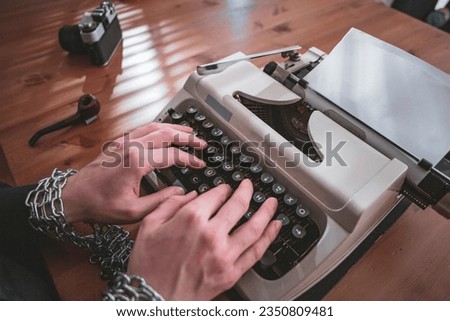 a journalist, writer, or screenwriter whose writing is censored. Royalty-Free Stock Photo #2350809481