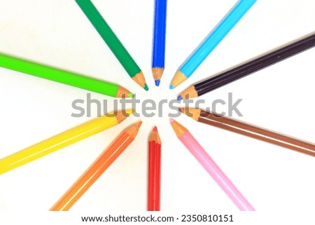 Colorful colored pencils circle with white background
