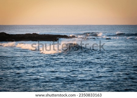 A small wave in the ocean.